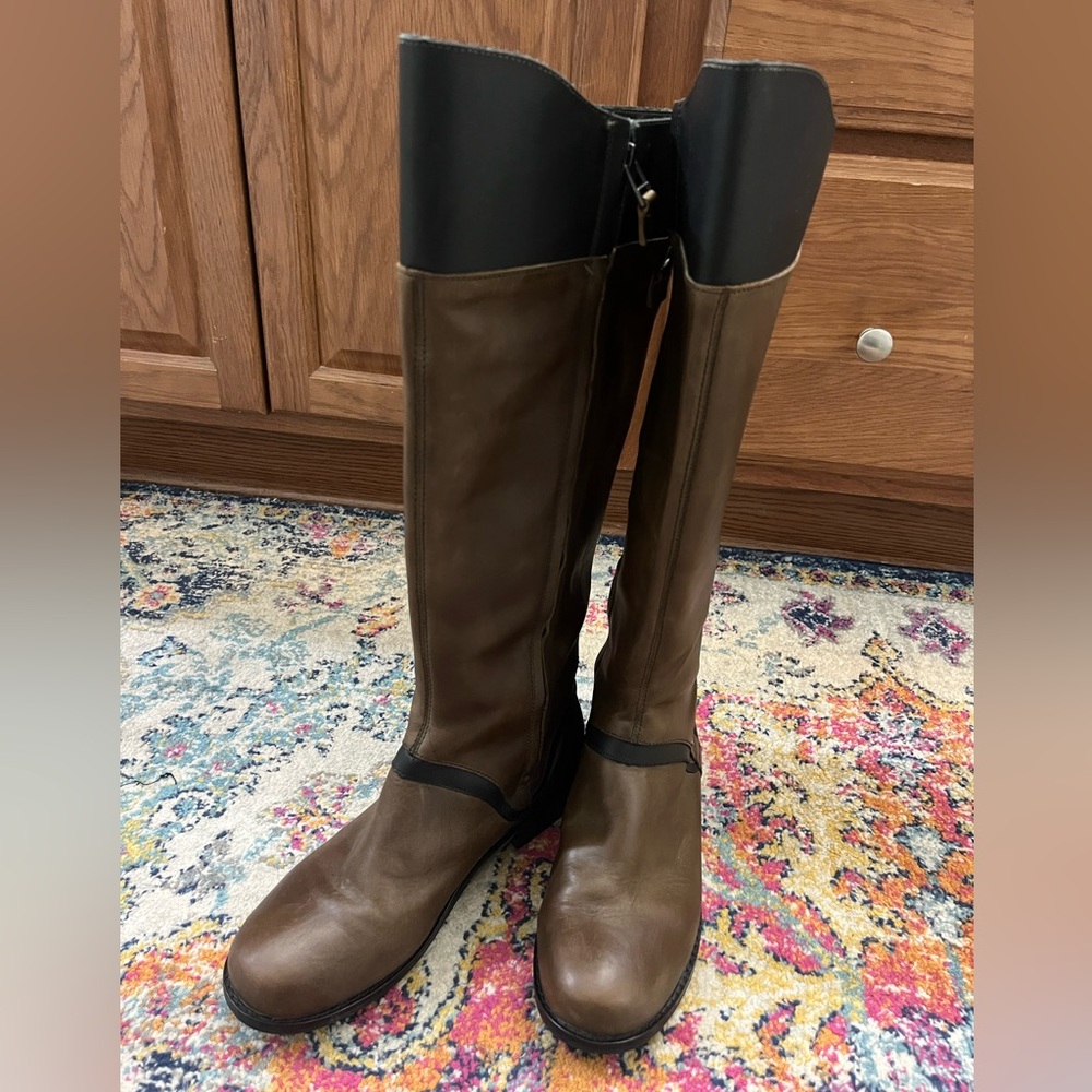 Olukai oiled brown and black boots with 1” heel and 7.5” shaft width.